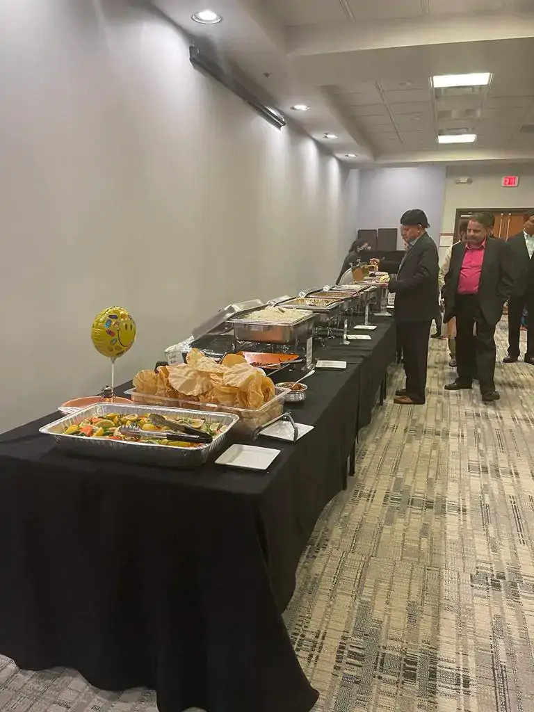Saffron catering buffet line served by staff